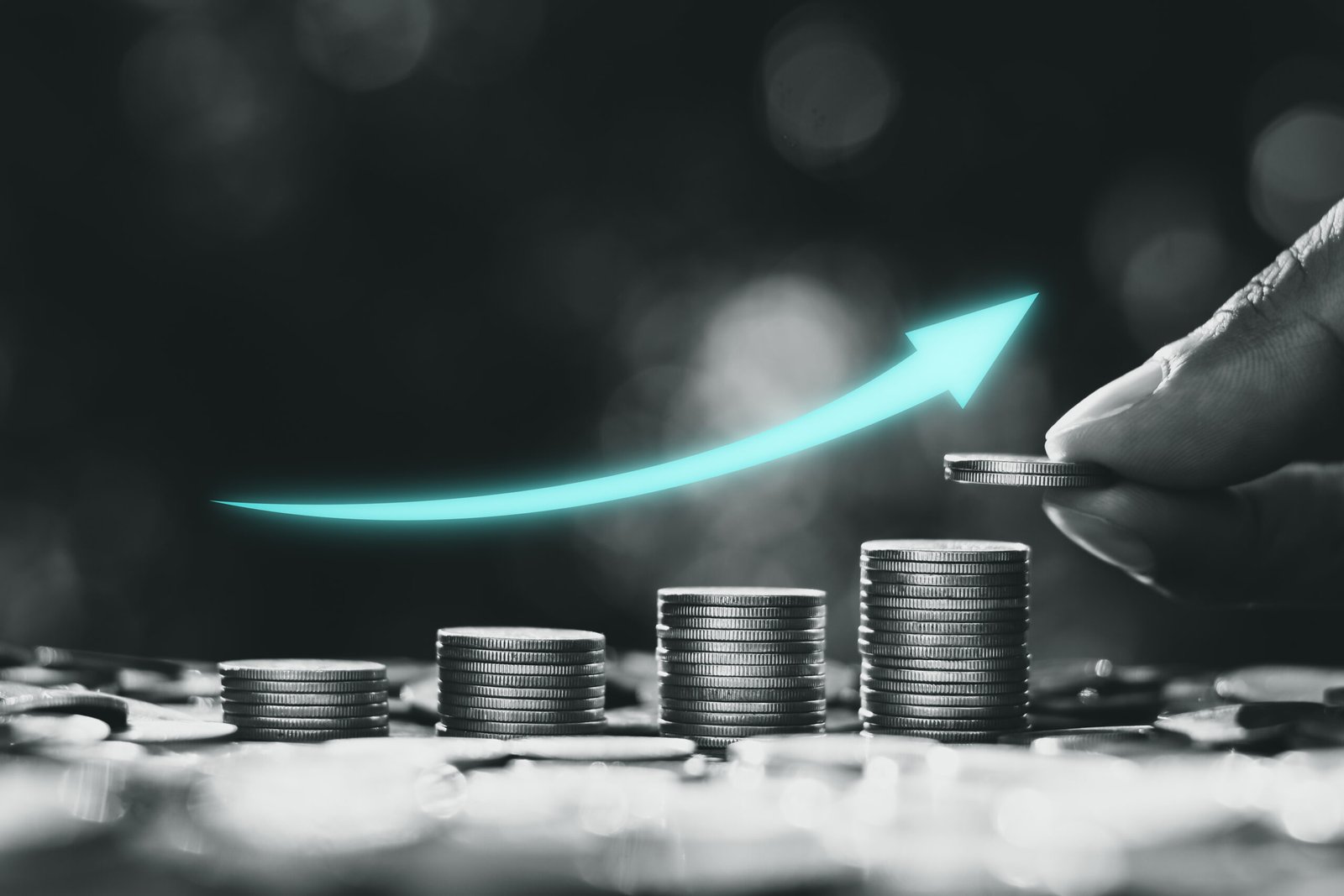 The coins are stacked together with the morning sun shining.